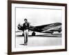 Amelia Earhart Standing in Front of the Lockheed Electra in Which She Disappeared in July 29, 1937-null-Framed Photo