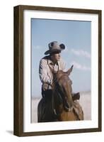 American Actor Rock Hudson on a Horse During the Filming of 'Giant', Near Marfa, Texas, 1955-Allan Grant-Framed Photographic Print