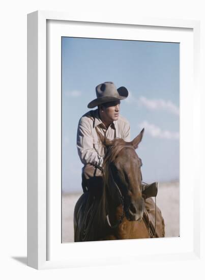 American Actor Rock Hudson on a Horse During the Filming of 'Giant', Near Marfa, Texas, 1955-Allan Grant-Framed Photographic Print