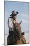 American Actor Rock Hudson on a Horse During the Filming of 'Giant', Near Marfa, Texas, 1955-Allan Grant-Mounted Photographic Print