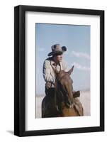 American Actor Rock Hudson on a Horse During the Filming of 'Giant', Near Marfa, Texas, 1955-Allan Grant-Framed Photographic Print