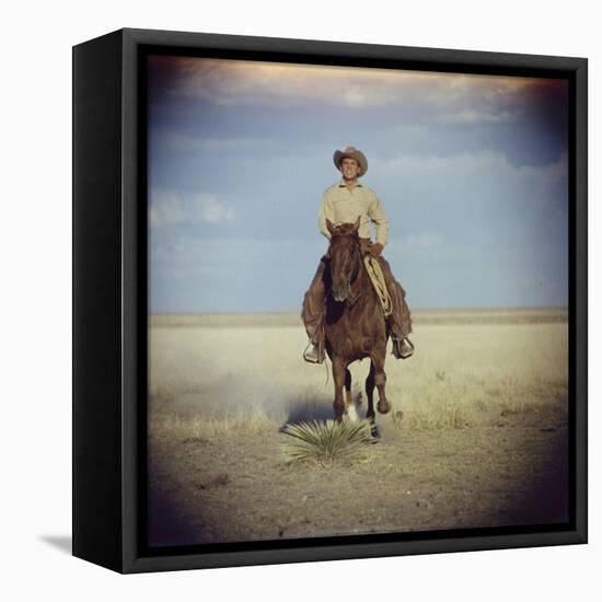 American Actor Rock Hudson Riding a Horse During Filming of 'Giant', Near Marfa, Texas, 1955-Allan Grant-Framed Stretched Canvas