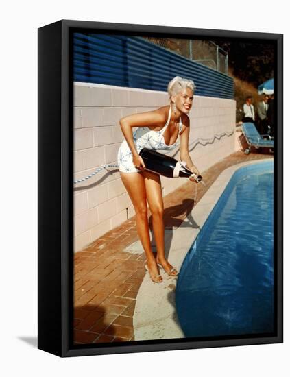 American Actress Jayne Mansfield with a Bottle of Champagne, Near a Swimming Pool, 1956-1957-null-Framed Stretched Canvas