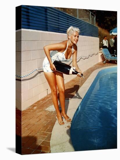 American Actress Jayne Mansfield with a Bottle of Champagne, Near a Swimming Pool, 1956-1957-null-Stretched Canvas