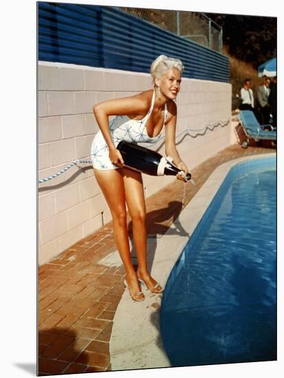 American Actress Jayne Mansfield with a Bottle of Champagne, Near a Swimming Pool, 1956-1957-null-Mounted Photo