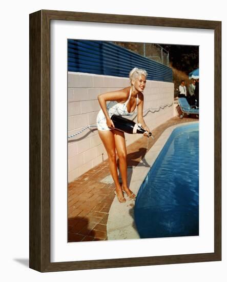 American Actress Jayne Mansfield with a Bottle of Champagne, Near a Swimming Pool, 1956-1957-null-Framed Photo