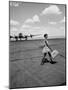 American Airline Hostess Crossing Field on Way to Jobs as a Model and Sales Clerk at Neiman Marcus-Lisa Larsen-Mounted Premium Photographic Print