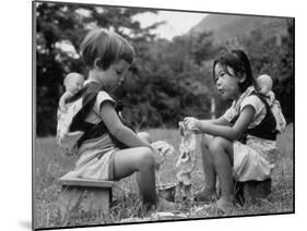 American Child Playing with Chinese Friend, Washing Doll Clothes-John Dominis-Mounted Photographic Print