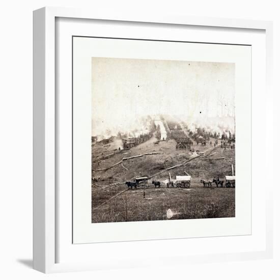 American Civil War: Three Horse-Drawn Covered Wagons in the Foreground. Soldiers Marching in Format-null-Framed Giclee Print