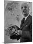 American Engineer and Architect Buckminster Fuller Holding a Globe-Andreas Feininger-Mounted Premium Photographic Print