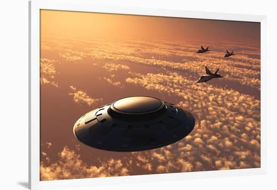 American F-22 Stealth Raptor Aircraft Chasing a Much Larger Ufo-null-Framed Art Print