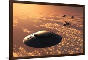 American F-22 Stealth Raptor Aircraft Chasing a Much Larger Ufo-null-Framed Art Print