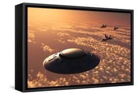 American F-22 Stealth Raptor Aircraft Chasing a Much Larger Ufo-null-Framed Stretched Canvas
