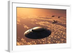 American F-22 Stealth Raptor Aircraft Chasing a Much Larger Ufo-null-Framed Art Print