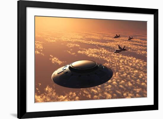 American F-22 Stealth Raptor Aircraft Chasing a Much Larger Ufo-null-Framed Art Print