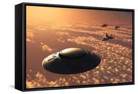 American F-22 Stealth Raptor Aircraft Chasing a Much Larger Ufo-null-Framed Stretched Canvas