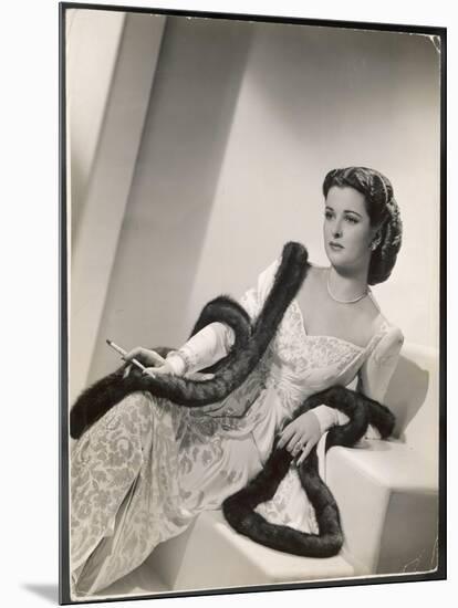 American Film Star Joan Bennett Models a Dress She Wears in Her Latest Picture "Girl Trouble"-null-Mounted Art Print