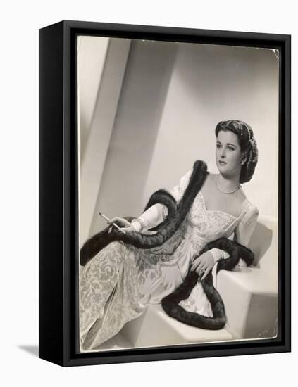 American Film Star Joan Bennett Models a Dress She Wears in Her Latest Picture "Girl Trouble"-null-Framed Stretched Canvas