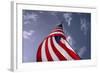 American Flag Against Blue-null-Framed Photo