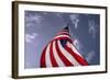 American Flag Against Blue-null-Framed Photo