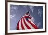 American Flag Against Blue-null-Framed Photo