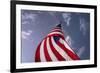 American Flag Against Blue-null-Framed Photo