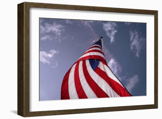 American Flag Against Blue-null-Framed Photo