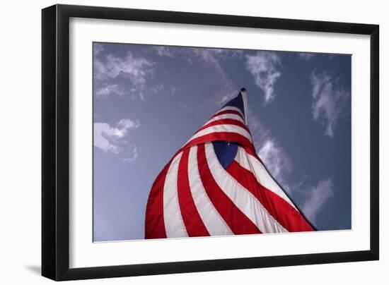 American Flag Against Blue-null-Framed Photo