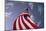 American Flag Against Blue-null-Mounted Photo