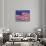 American Flag Blowing in the Wind-Joseph Sohm-Photographic Print displayed on a wall