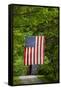 American Flag Hanging Above Gravel Road-Paul Souders-Framed Stretched Canvas