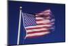 American Flag is Blurred with the Motion of the Wind against the Blue Sky-Richard T. Nowitz-Mounted Photographic Print