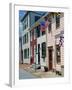 American Flag on Wooden Buildings on a Street in Annapolis, Maryland, USA-Hodson Jonathan-Framed Photographic Print