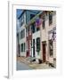 American Flag on Wooden Buildings on a Street in Annapolis, Maryland, USA-Hodson Jonathan-Framed Photographic Print