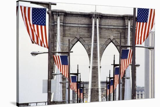 American Flags Lining Brooklyn Bridge-null-Stretched Canvas