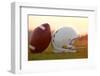 American Football and Helmet on the Field at Sunset-33ft-Framed Photographic Print