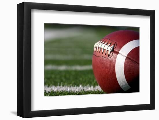 American Football close up on Field with Yard Lines in the Distance-33ft-Framed Photographic Print