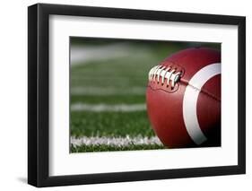 American Football close up on Field with Yard Lines in the Distance-33ft-Framed Photographic Print