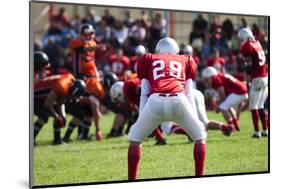 American Football Game with out of Focus Players in the Background-melis-Mounted Photographic Print