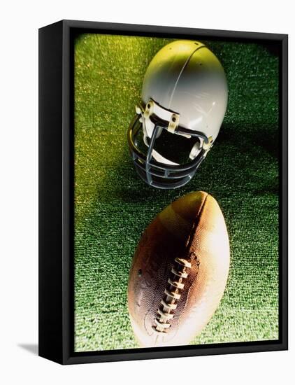 American Football Helmet and a Football-null-Framed Stretched Canvas