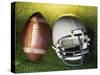 American Football Helmet and a Football-null-Stretched Canvas