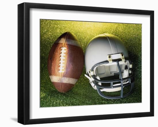 American Football Helmet and a Football-null-Framed Photographic Print