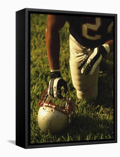 American Football Player Kneeling on the Field-null-Framed Stretched Canvas