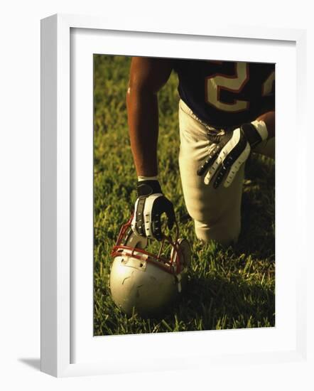 American Football Player Kneeling on the Field-null-Framed Photographic Print