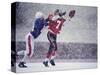 American Football Player Reaching for the Ball-null-Stretched Canvas