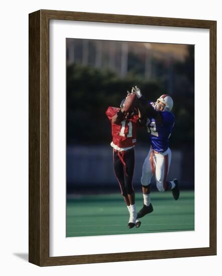 American Football Player Reaching for the Ball-null-Framed Photographic Print