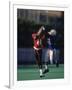 American Football Player Reaching for the Ball-null-Framed Photographic Print