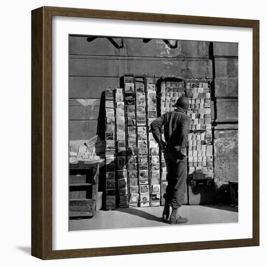 American GI Perusing Book Vendors' Stand during WWII-Robert Capa-Framed Photographic Print