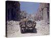 American Jeeps Travelling Through Completely Bombed Out Town During the Drive Towards Rome, Wii-Carl Mydans-Stretched Canvas