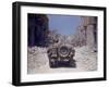 American Jeeps Travelling Through Completely Bombed Out Town During the Drive Towards Rome, Wii-Carl Mydans-Framed Photographic Print